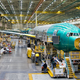 Image for article titled Boeing Will Dispatch Six Dumptrucks Per Minute To Build New Factory